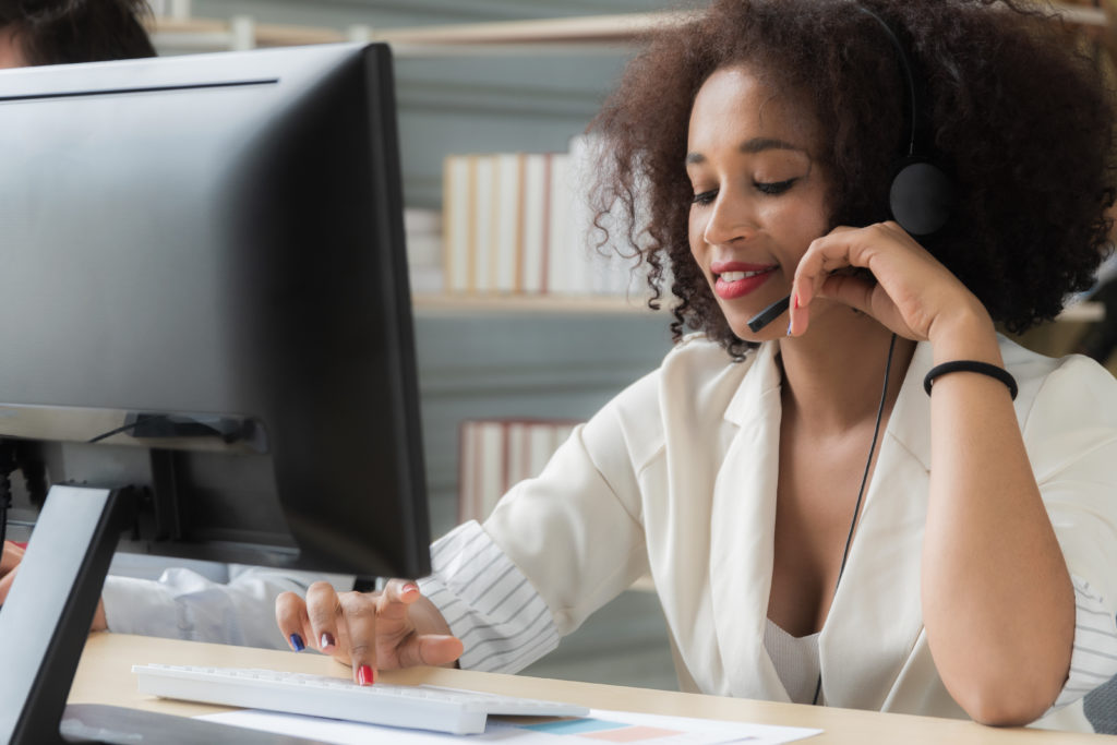 Pharma sales rep talking on the phone with a Physician.