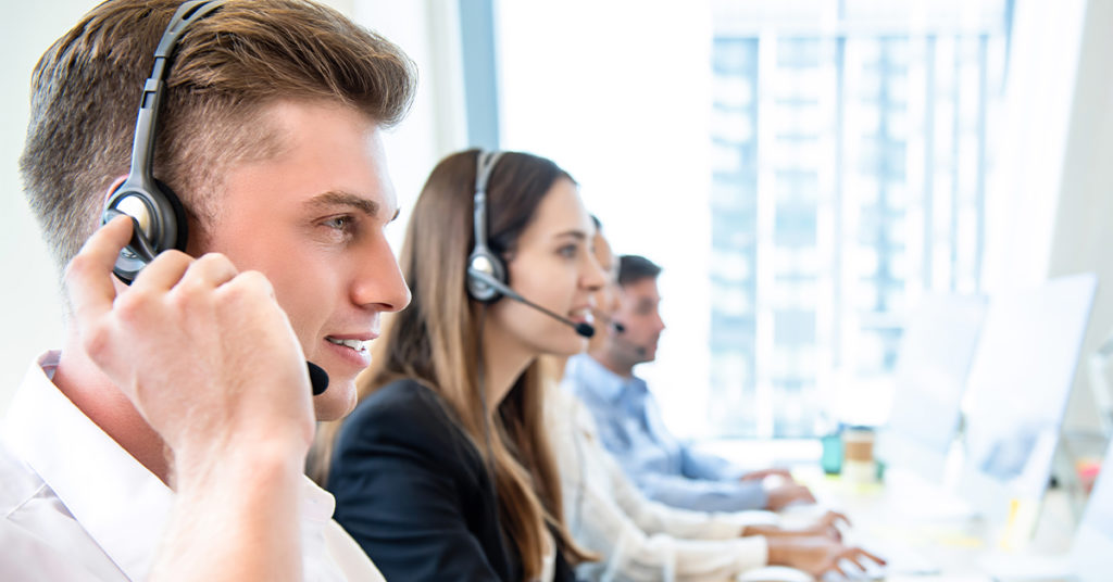 Customer service representative talking to healthcare patients