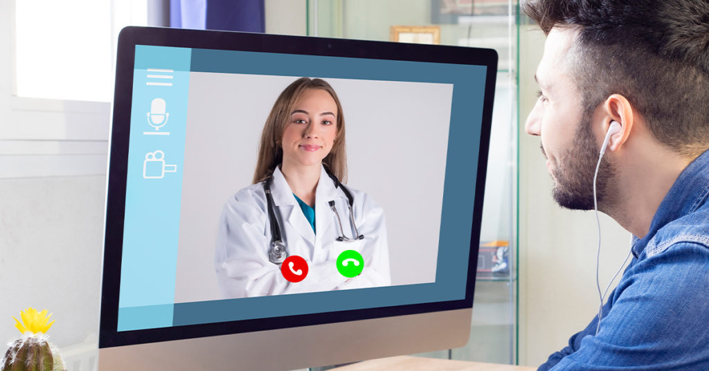 Patient talking to his doctor on video chat telemedicine