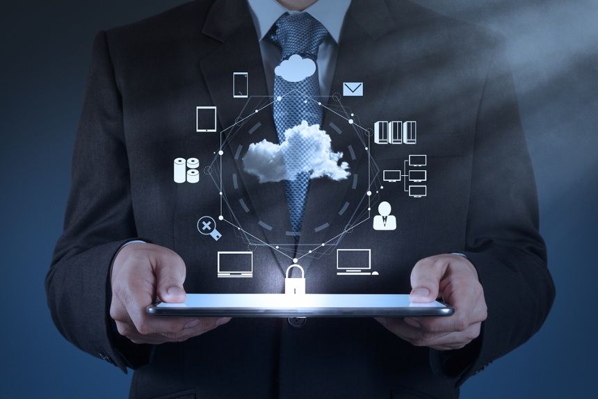 Businessman-hand-working-with-a-Cloud-Computing-diagram-on-the-new-computer-interface-as-concept-2.jpeg