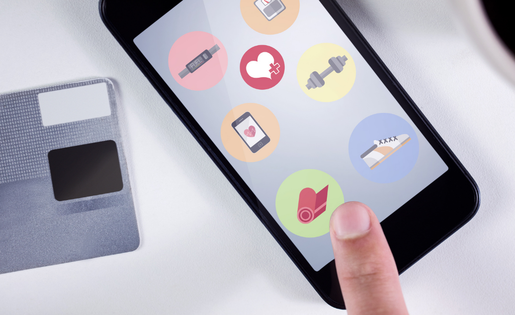 [Businessman using smartphone for digital analysis fitness