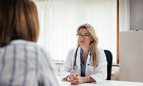 Female Doctor & Patient discussion