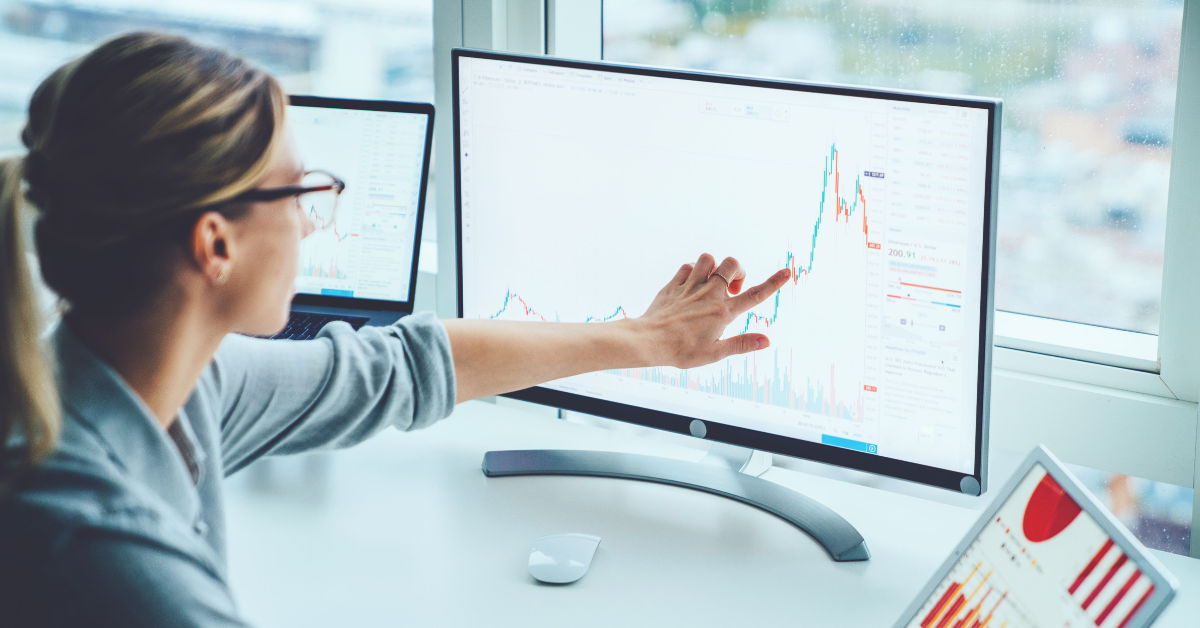 Young businesswoman analyzing data information of market